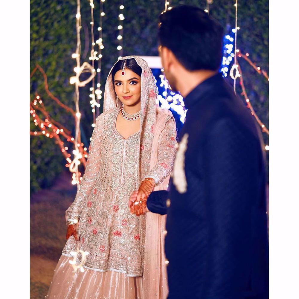 Picture of A breathtaking bride on her engagement day in a blush Farah Talib Aziz bridal