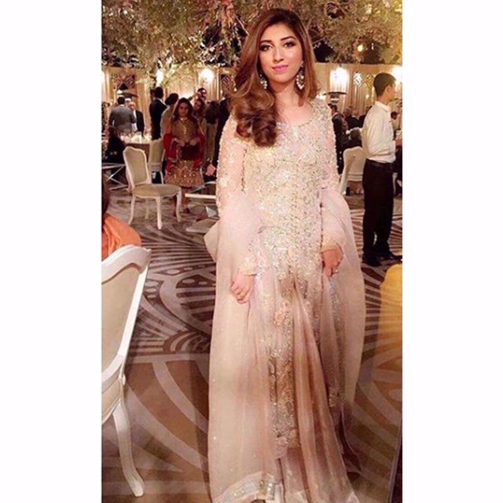 Picture of Maham Baig looking ethereal in a rose pink Farah Talib Aziz ensemble