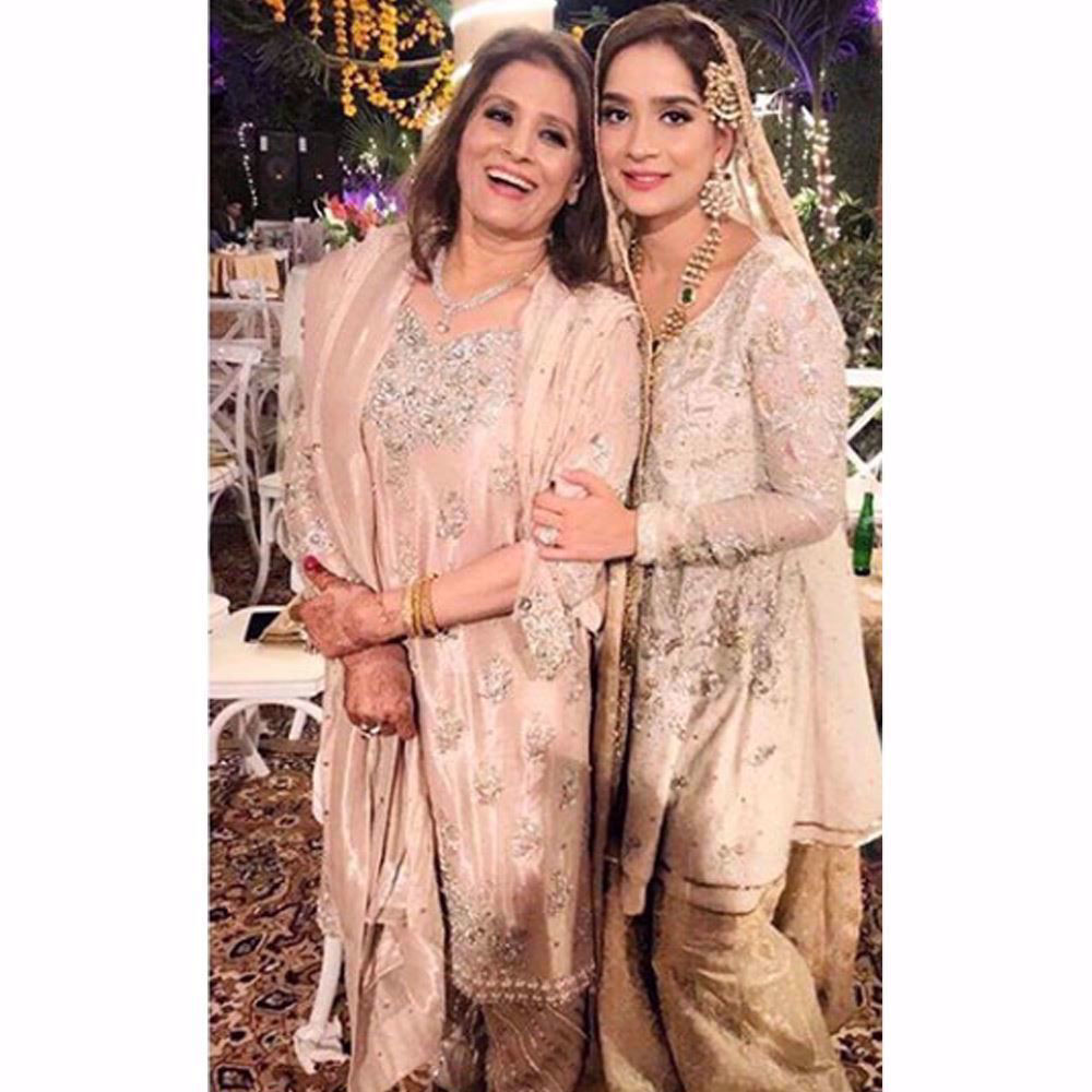 Picture of Aminah Tariq and her mother, Beena Tariq both looking pretty in Farah Talib Aziz pastels