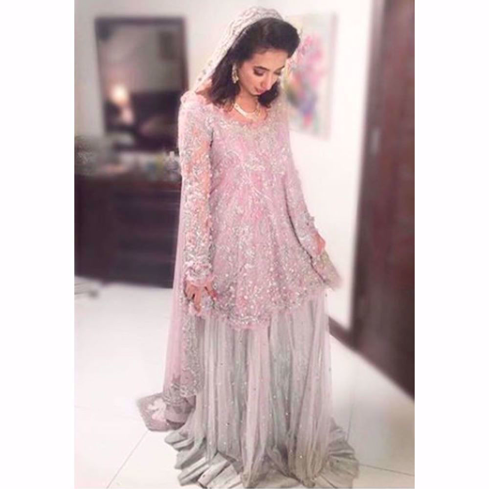 Picture of Komal Aziz Khan looking ethereal in a lavender and silver Farah Talib Aziz Bridal