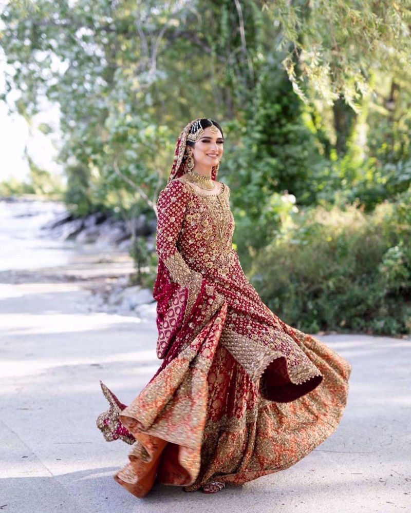 Picture of Saliha Ayub, gorgeous in a traditional scarlet red #Farah Talib Aziz bridal