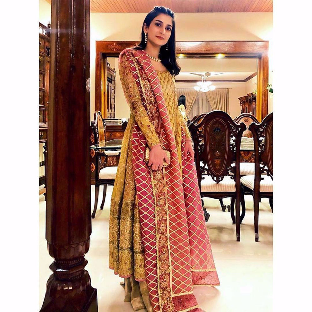 Picture of Alishay Adnan looks perfectly polished in a timeless #FarahTalibAziz kalidaar with a gorgeous gota embellished dupatta