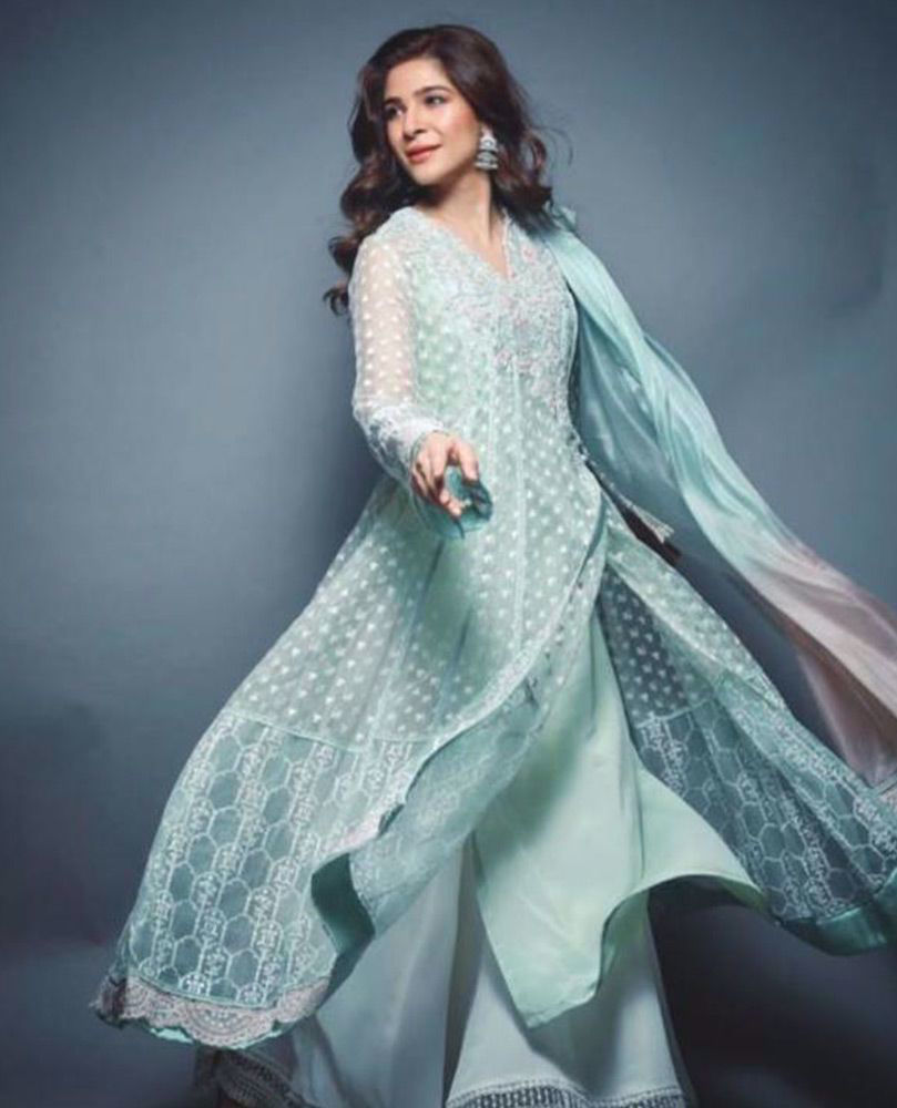 Picture of Ayesha Omar giving life to our day in an aqua hand embellished #FarahTalibAziz luxe Pret outfit that’s perfect to brighten your Ramadan and Eid celebrations