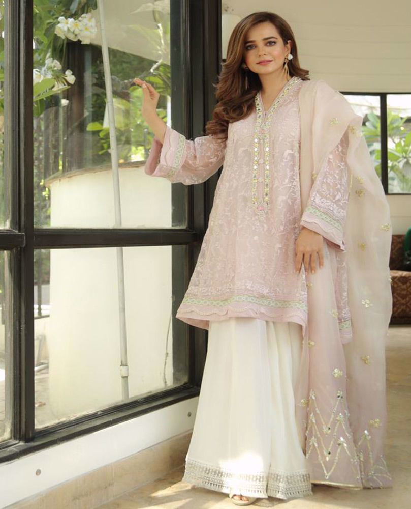 Picture of ⁠#SumbulIqbal beautiful in our Mauve Sheesh kurta. Just the perfect amount of delicate sheesha embroidery layered over a delicate floral tapestry make this ensemble truly irresistible!