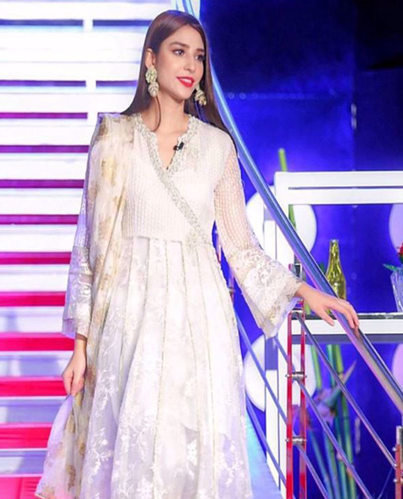 Picture of #RamshaKhan giving life to our day in an ivory hand embellished #FarahTalibAziz luxe Pret outfit that’s perfect to brighten your Ramadan and Eid celebrations