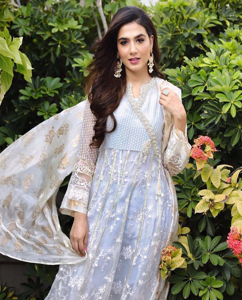 Picture of #ManshaPasha beautiful in an ice blue hand embellished #FarahTalibAziz luxe Pret outfit that’s perfect for all festivities!