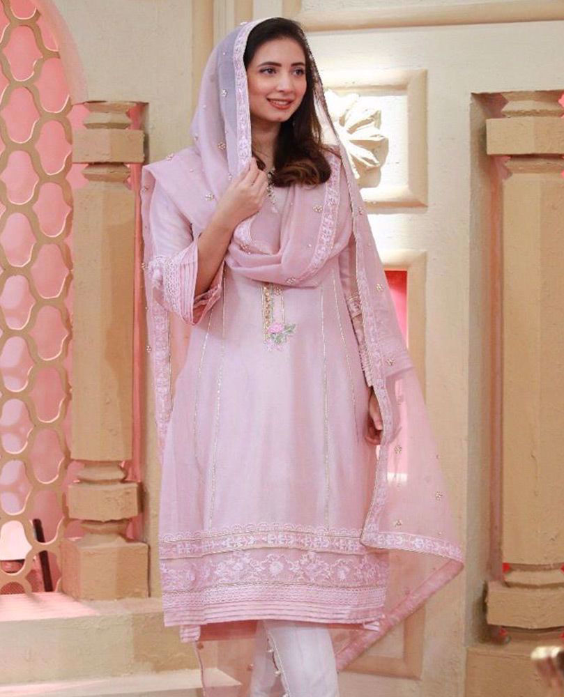 Picture of #KomalAzizKhan giving us major style goals in a chai pink hand embellished #FarahTalibAziz luxe Pret outfit, that’s perfect to add some sparkle your Ramadan and Eid celebrations.⁠