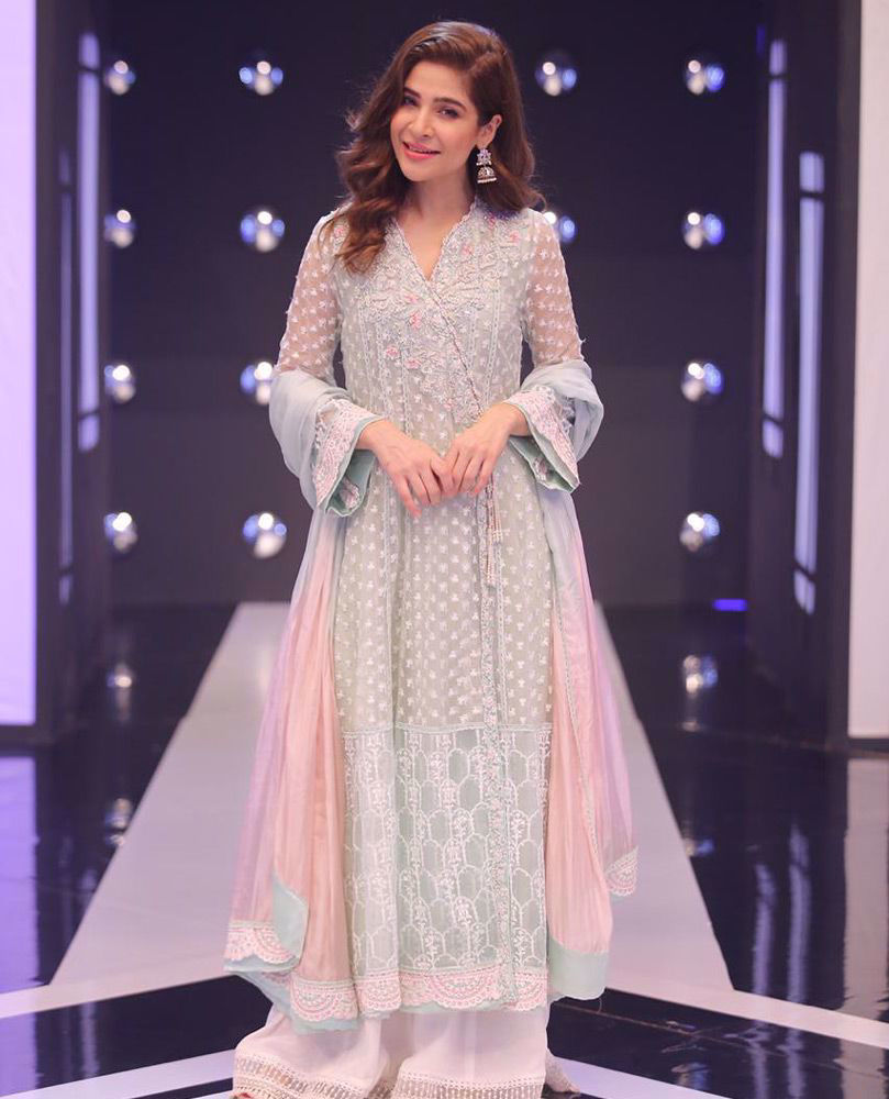 Picture of #AyeshaOmar giving life to our day in an aqua hand embellished #FarahTalibAziz luxe Pret outfit that’s perfect to brighten your Ramadan and Eid celebrations