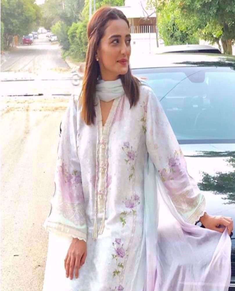 Picture of #MomalSheikh beautiful wearing one of our favourite aqua Luxe Pret looks from the latest #FarahTalibAziz Eid collection #Suri this Eid ✨
