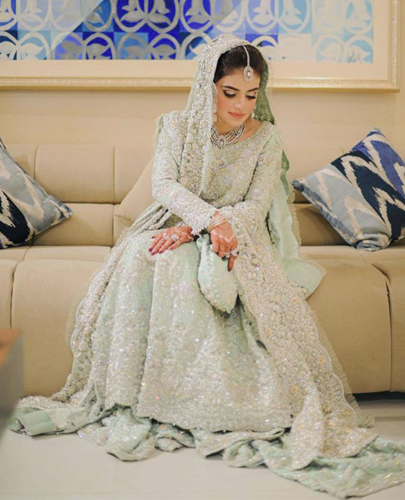 Picture of A BREATHTAKING BRIDE ON HER WEDDING DAY IN A ICE BLUE FARAH TALIB AZIZ SIGNATURE BRIDAL