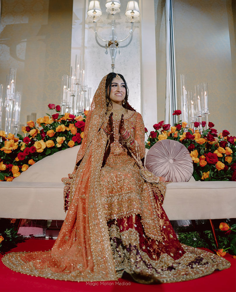 Picture of FARAH TALIB AZIZ GIVES US A MASTERCLASS ON HOW TO CARRY THE ICONIC BRUNT ORANGE BRIDAL.
