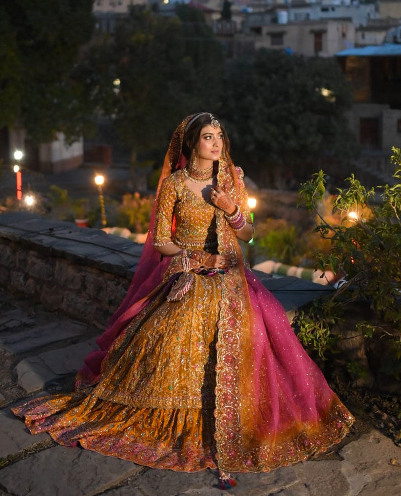 A GLOWING BRIDE IN A SIGNATURE #FARAHTALIBAZIZ ENSEMBLE.