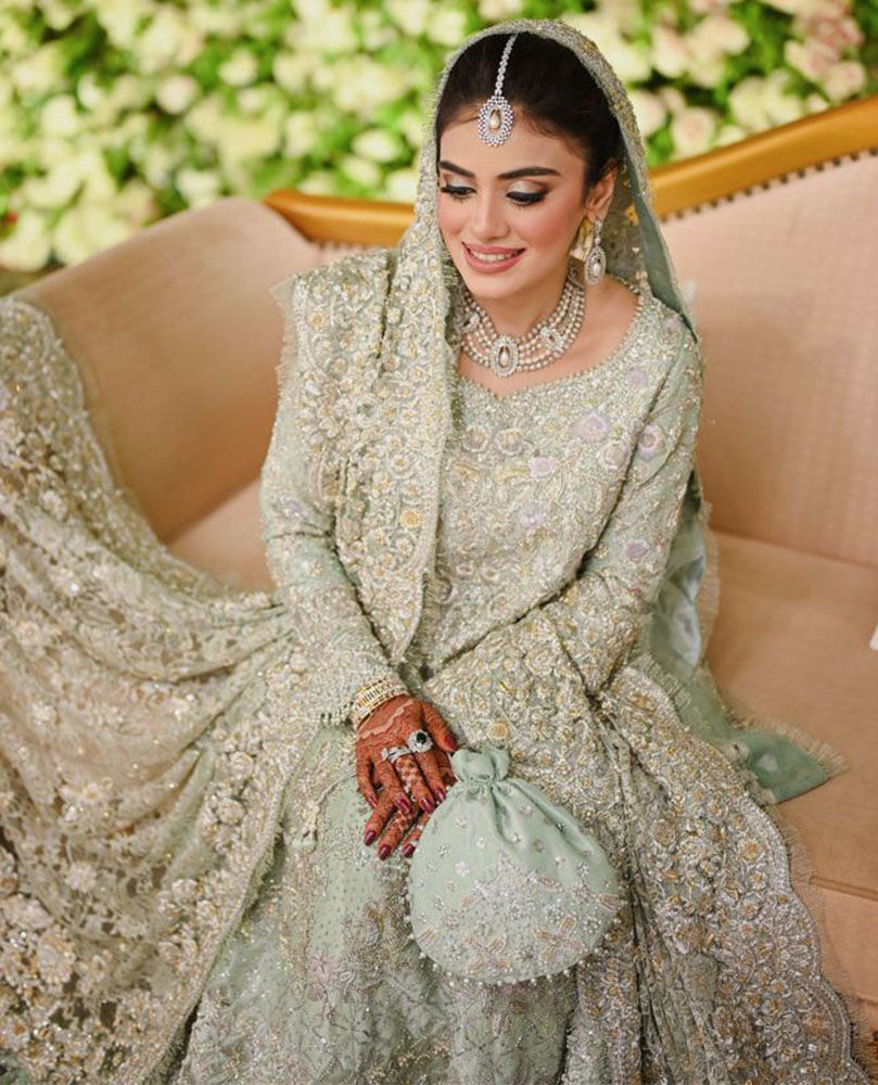 Picture of A BREATHTAKING BRIDE ON HER VALIMA DAY IN A ICE BLUE FARAH TALIB AZIZ SIGNATURE BRIDAL