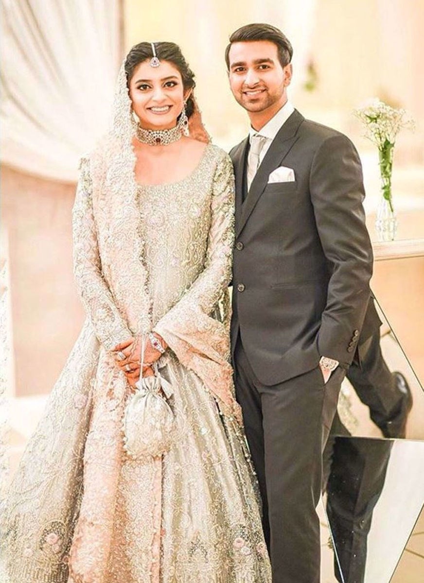 Mariam On Her Wedding Reception In An Aqua And Pink Bridal
