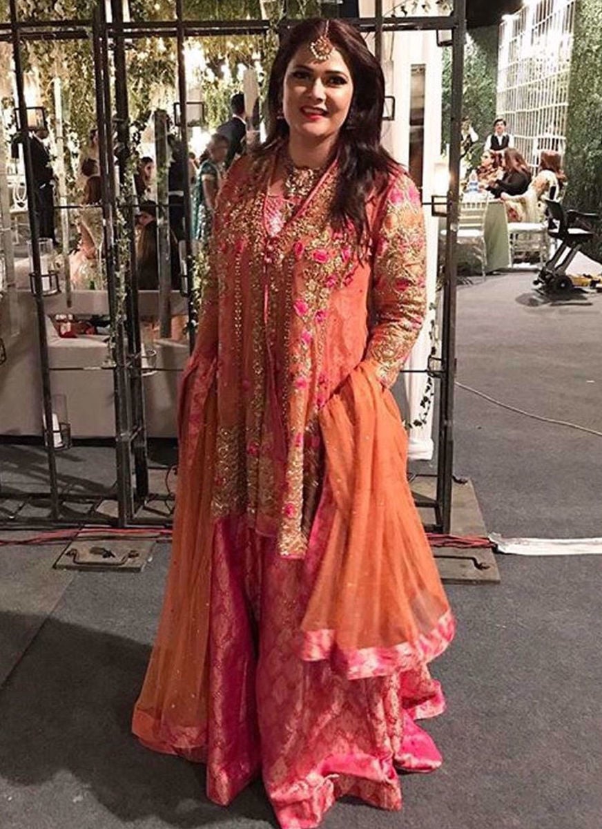 Noreen Lakhani In A Festive Coral And Pink Ensemble